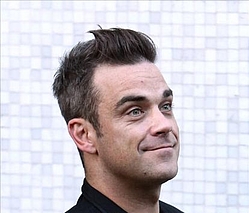 Robbie Williams getting a buzz out of art