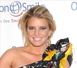 Jessica Simpson finishes Christmas album and it`s a hit with nephew Bronx