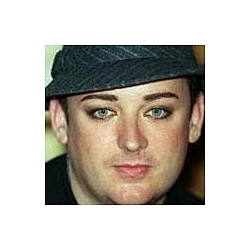 Boy George got the inside track on George Michael while in prison