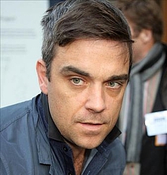 Robbie Williams said he will get naked if it gets Take That to number one