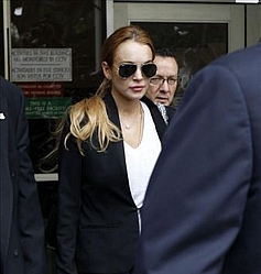 Lindsay Lohan avoids jail and heads back to rehab