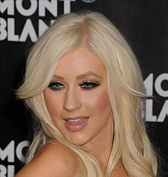 Christina Aguilera looks like Marilyn Monroe as she advertises her perfume