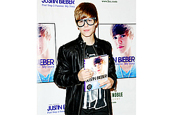 Justin Bieber Talks Music, God, Hair at Book Signing