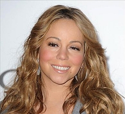 Mariah Carey not about to hang up her high heels
