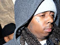 Lil Wayne &#039;Didn&#039;t Want Any Problems&#039; Behind Bars, Source Says