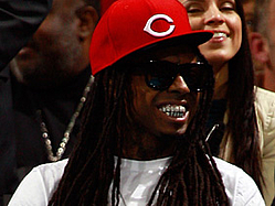 Lil Wayne Attends New Orleans Hornets Game