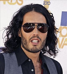 Russell Brand says Katy Perry has got him under the thumb
