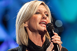 Olivia Newton-John Sings &#039;Summer Nights&#039; With Rescued Chilean Miner
