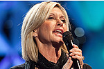 Olivia Newton-John Sings &#039;Summer Nights&#039; With Rescued Chilean Miner - Olivia Newton-John had a very special guest join her on stage during a concert in Chile&#039;s capital &hellip;