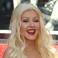 Christina Aguilera buys five Christmas trees