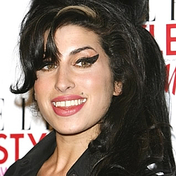 Amy Winehouse &#039;makes monkey friend&#039;