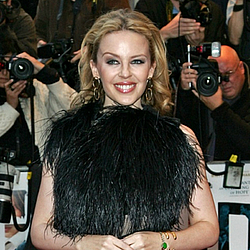 Kylie Minogue dreaming of a white christmas ‎