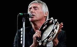 Paul Weller brings his sons onstage at Wembley Arena gig