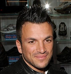 Katie Price announces Peter Andre has been hospitalised