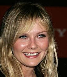 Kirsten Dunst gets a cookery lesson on TV show