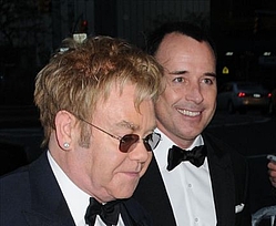 Elton John `blessed` in becoming a dad