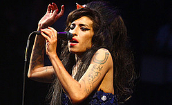 Amy Winehouse to debut new material this month