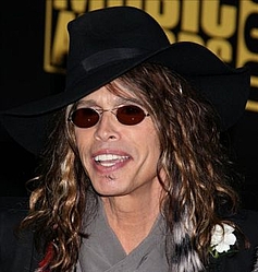Steven Tyler `fell off stage while high on drugs`