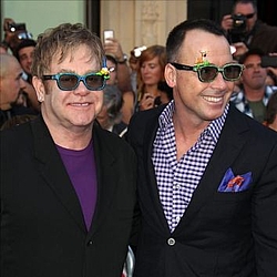 Elton John `closer to david Furnish since welcoming son`