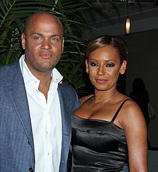 Mel B puts on united front with hubby