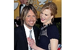 Nicole Kidman and Keith Urban share first photo of baby daughter - Proud dad Urban shared the iPhone shot of his wife Nicole Kidman cuddling with their five-week-old &hellip;