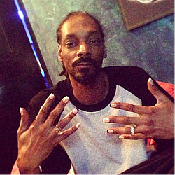 50 Cent hits out at Snoop Dogg for getting his nails manicured