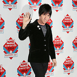 Johnny Marr tour under threat after rocker broke his hand while running