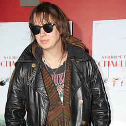 Julian Casablancas to record with The Strokes, release solo LP in 2014
