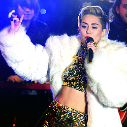 Miley Cyrus cancels Bangerz gig, is rushed to hospital instead