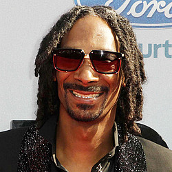 Snoop Dogg calls on rap community to help end gun violence