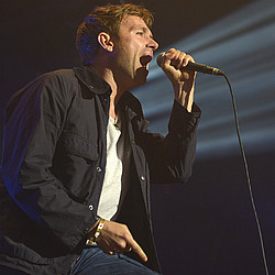 Damon Albarn overcomes shark phobia by diving with them...