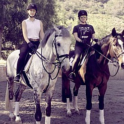 Iggy Azalea and Kesha ignore controversies by horse riding