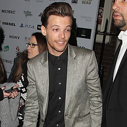 Louis Tomlinson &#039;is quickly learning to be a dad&#039;