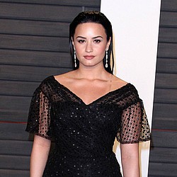 Demi Lovato reflects on a year of loss
