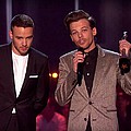 One Direction stars stage mini-reunion at Brit Awards - One Direction stars Louis Tomlinson and Liam Payne had a mini-reunion on the Brit Awards red carpet &hellip;