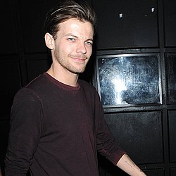 Louis Tomlinson shares first snap of son