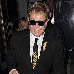 Sir Elton John scaling back on gigs to be a dad