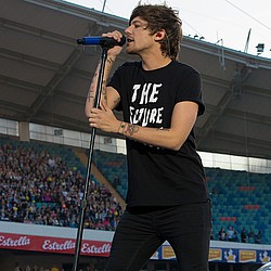 Louis Tomlinson: Why throw things at us?