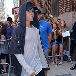 Justin Bieber apologises for concert walk-out