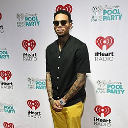 Chris Brown &#039;pointing finger at friends over robbery&#039;