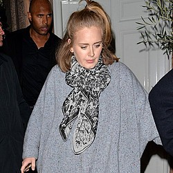 Adele ‘making beautiful music with Collins’