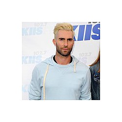 Adam Levine keeps Maroon 5 mystery alive