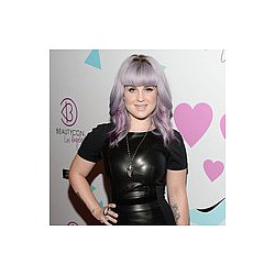 Kelly Osbourne slams tabloids