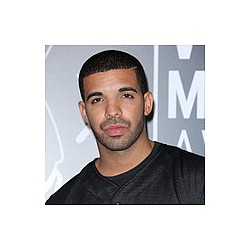 Drake &#039;doting on Rihanna&#039;