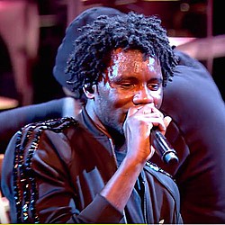 Wretch 32 duets with surprised festival goer