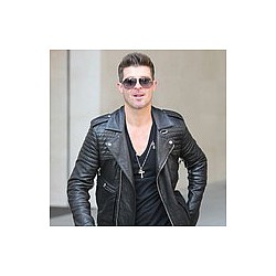 Robin Thicke: My wife is rude