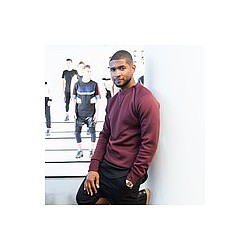 Usher delaying album