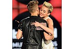 Justin Bieber &#039;flirts with Miley Cyrus&#039; - Justin Bieber has been photographed flirting with Miley Cyrus at a nightspot.The star is single &hellip;