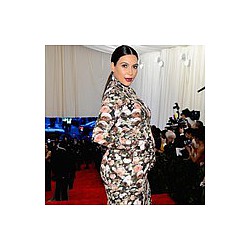 Kim Kardashian &#039;makes baby picture plans&#039;
