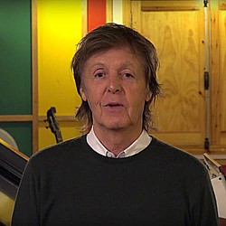 Paul McCartney and son play with Ronnie Wood